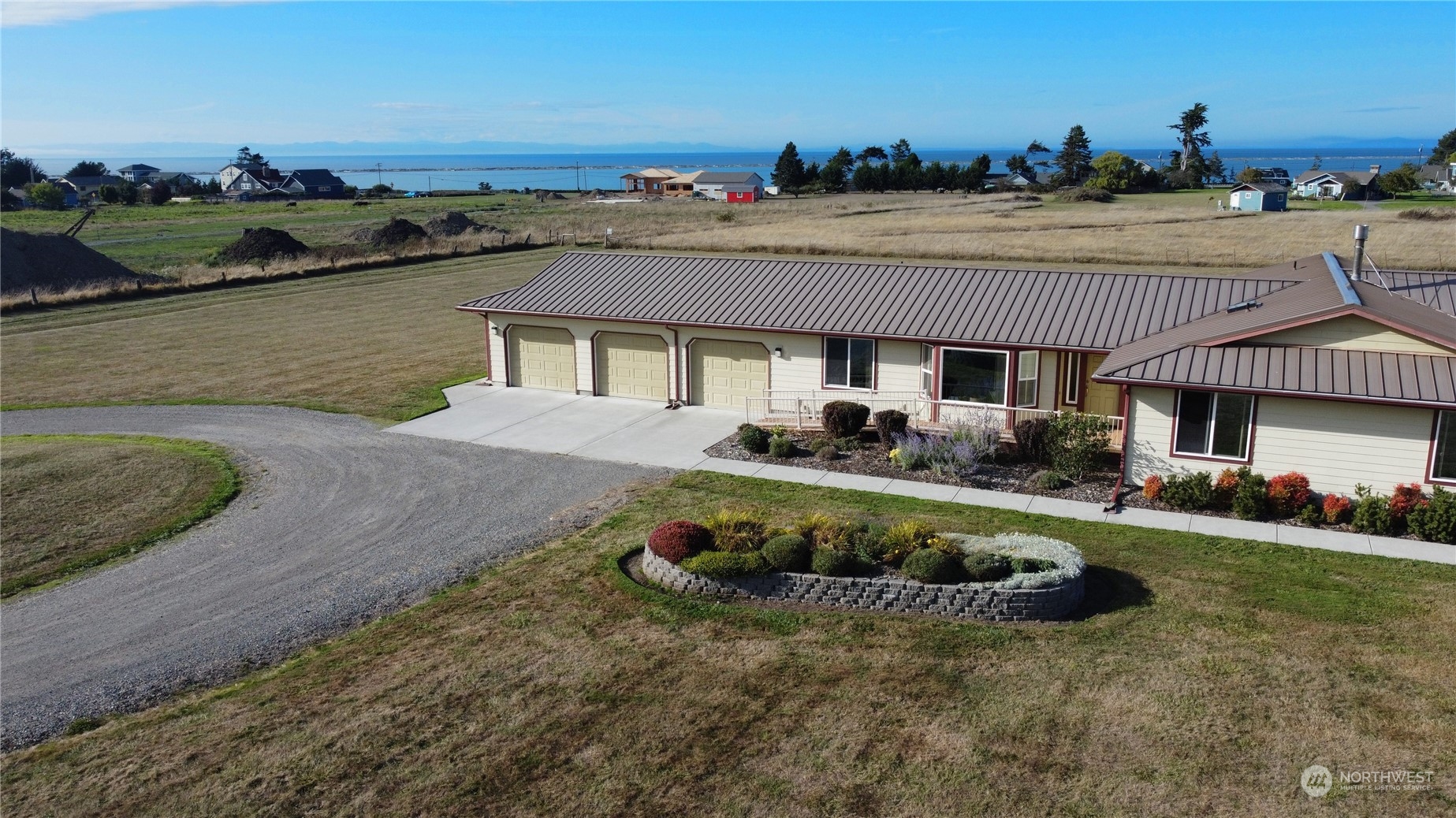 123 East Anderson Road Sequim, WA 98382 - Photo 40 of 40 a view of a house with pool and a yard