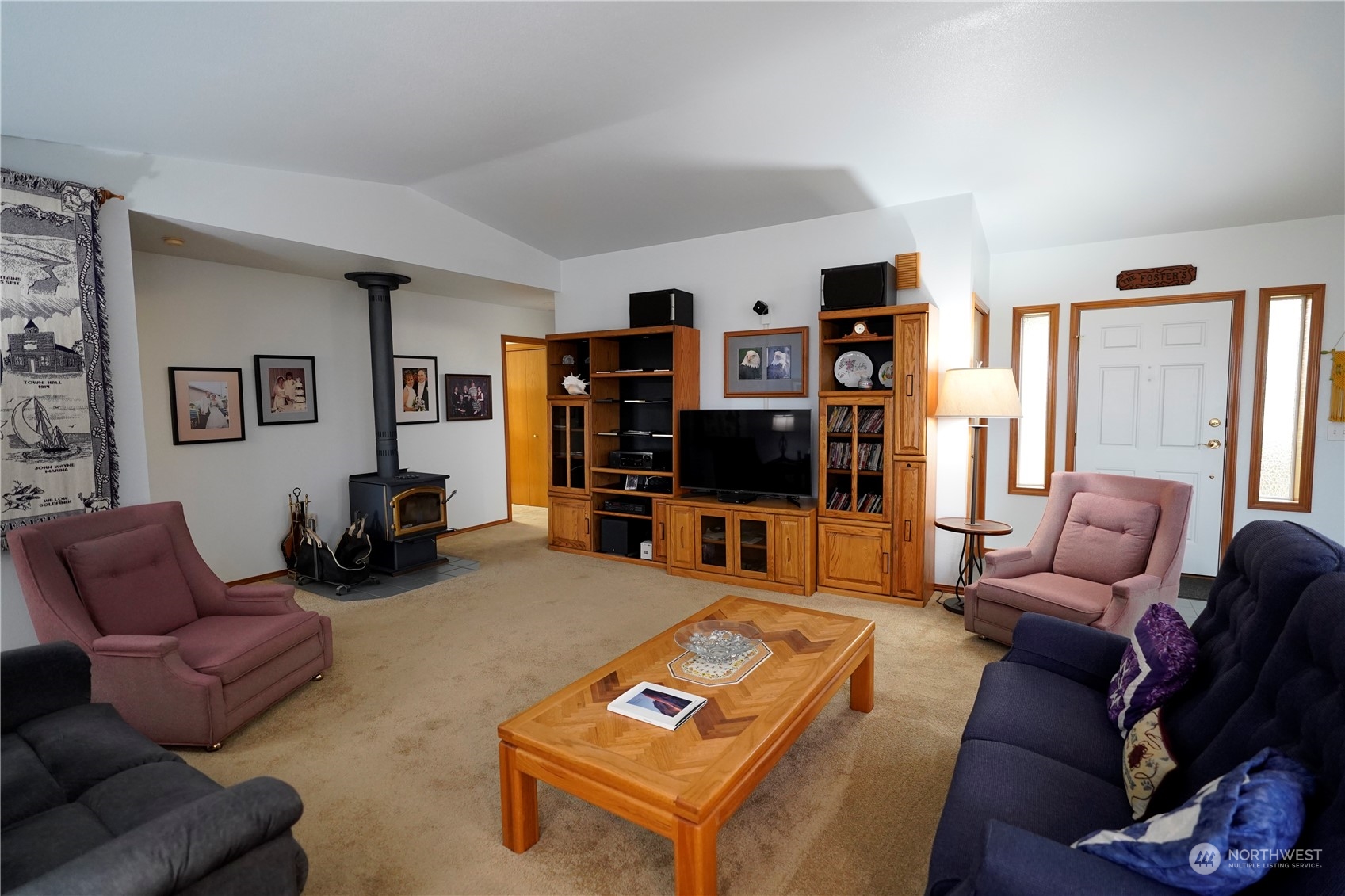 123 East Anderson Road Sequim, WA 98382 - Photo 4 of 40 a living room with furniture a flat screen tv and a large window