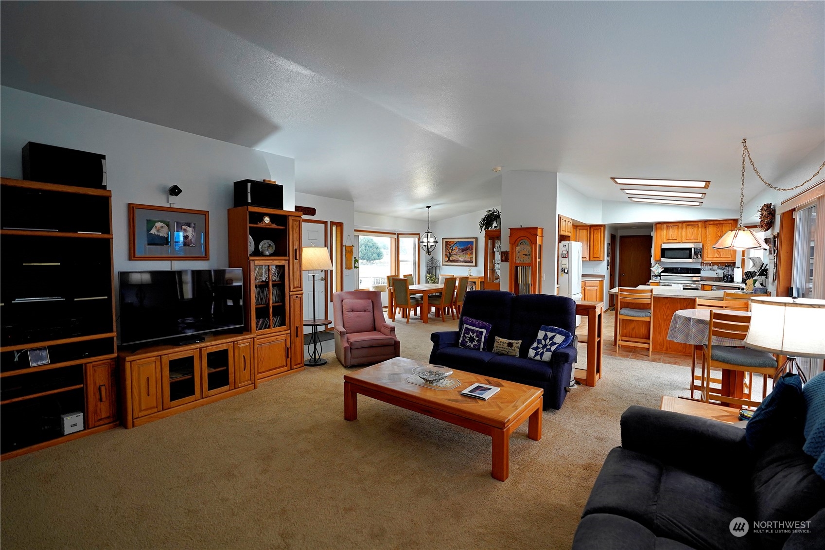 123 East Anderson Road Sequim, WA 98382 - Photo 5 of 40 a living room with furniture and a flat screen tv
