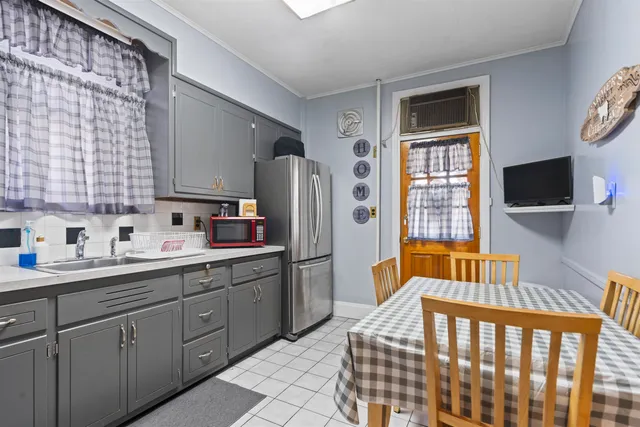 a bathroom with a sink a mirror and a bathtub