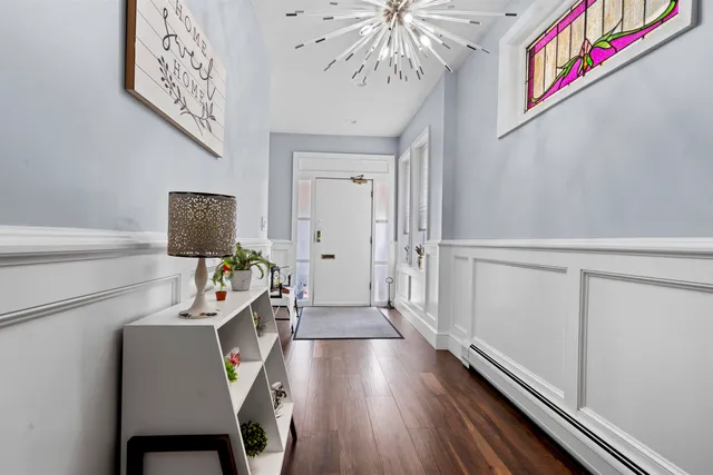 a room with furniture and wooden floor