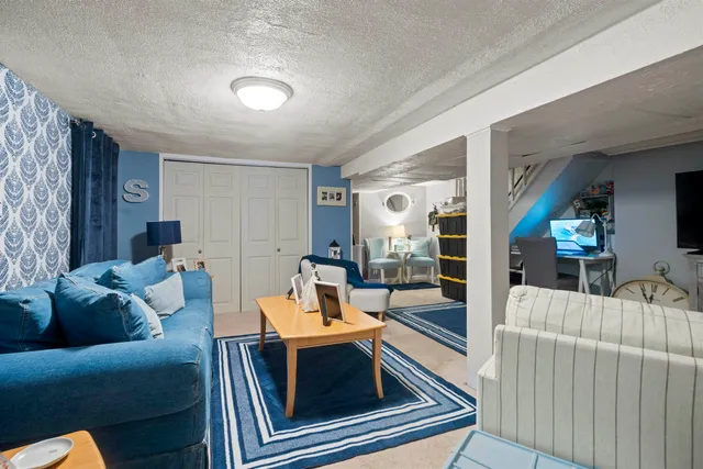 a living room with furniture and a table