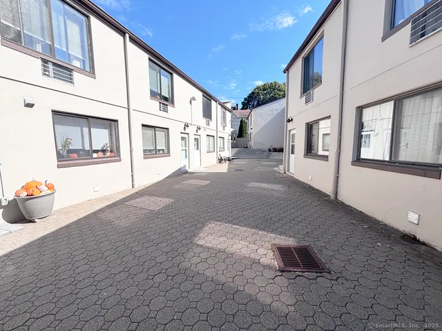 a view of a street with buildings