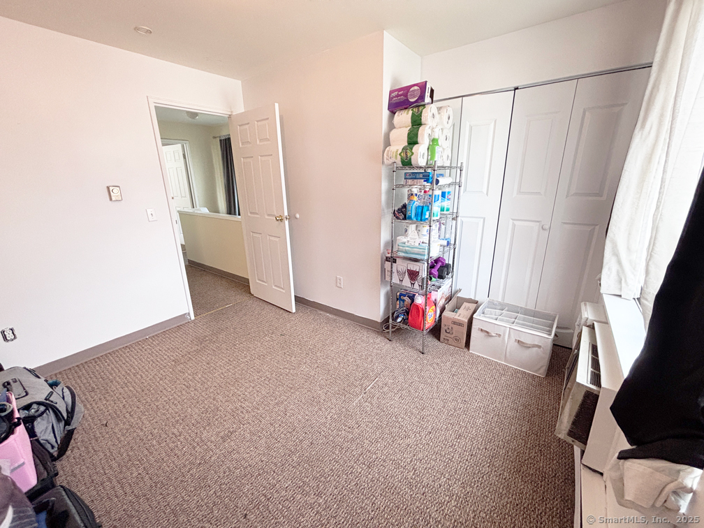 84 Taylor Avenue, Unit 1 Norwalk, CT 06854 - Photo 18 of 21 a view of a room with toys