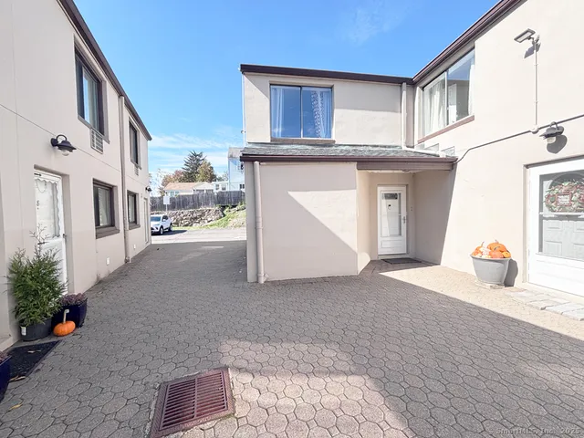 a view of a street with cars