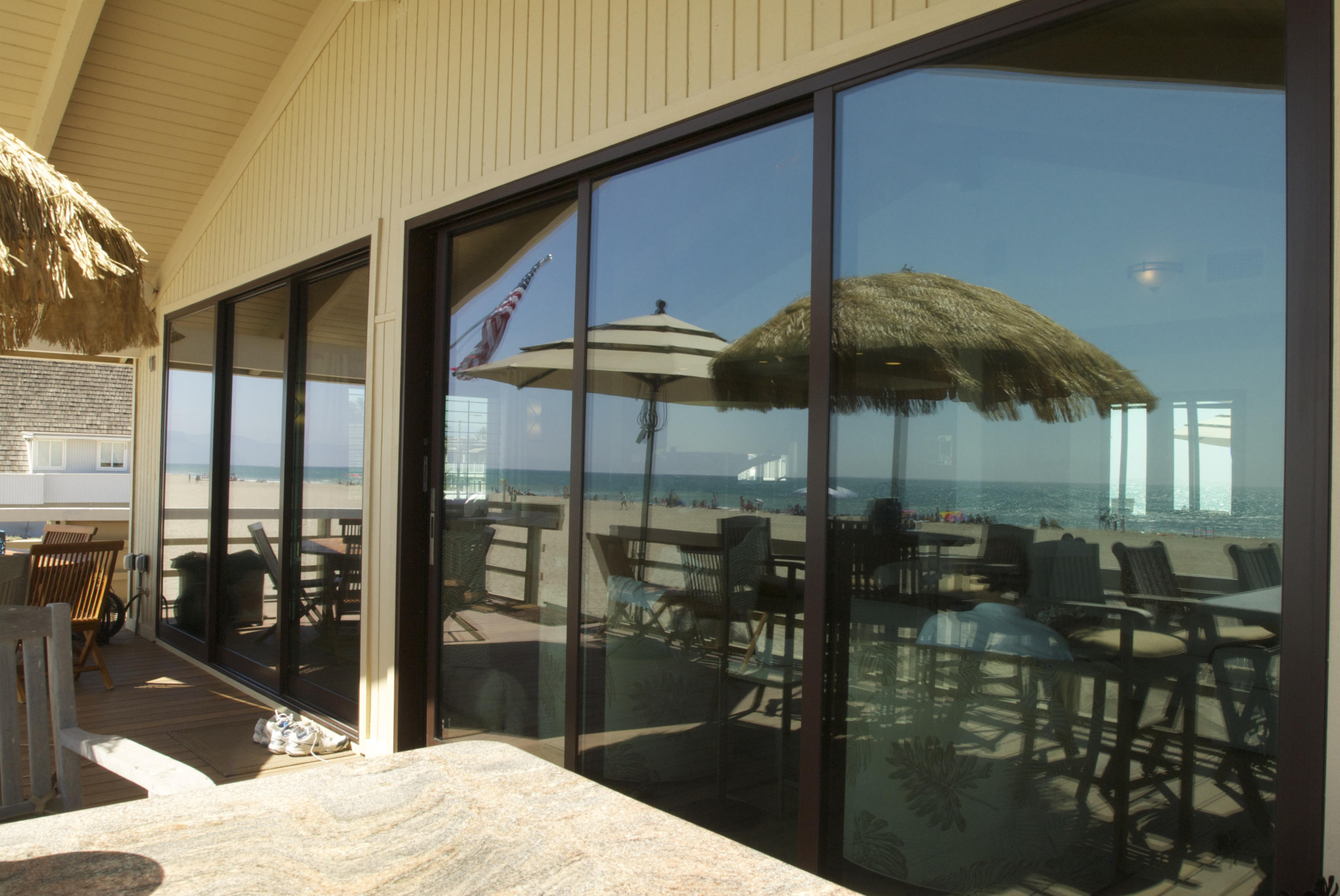 867 Mandalay Beach Road Oxnard, CA 93035 - Photo 13 of 27 a bedroom with a bed a table and chairs