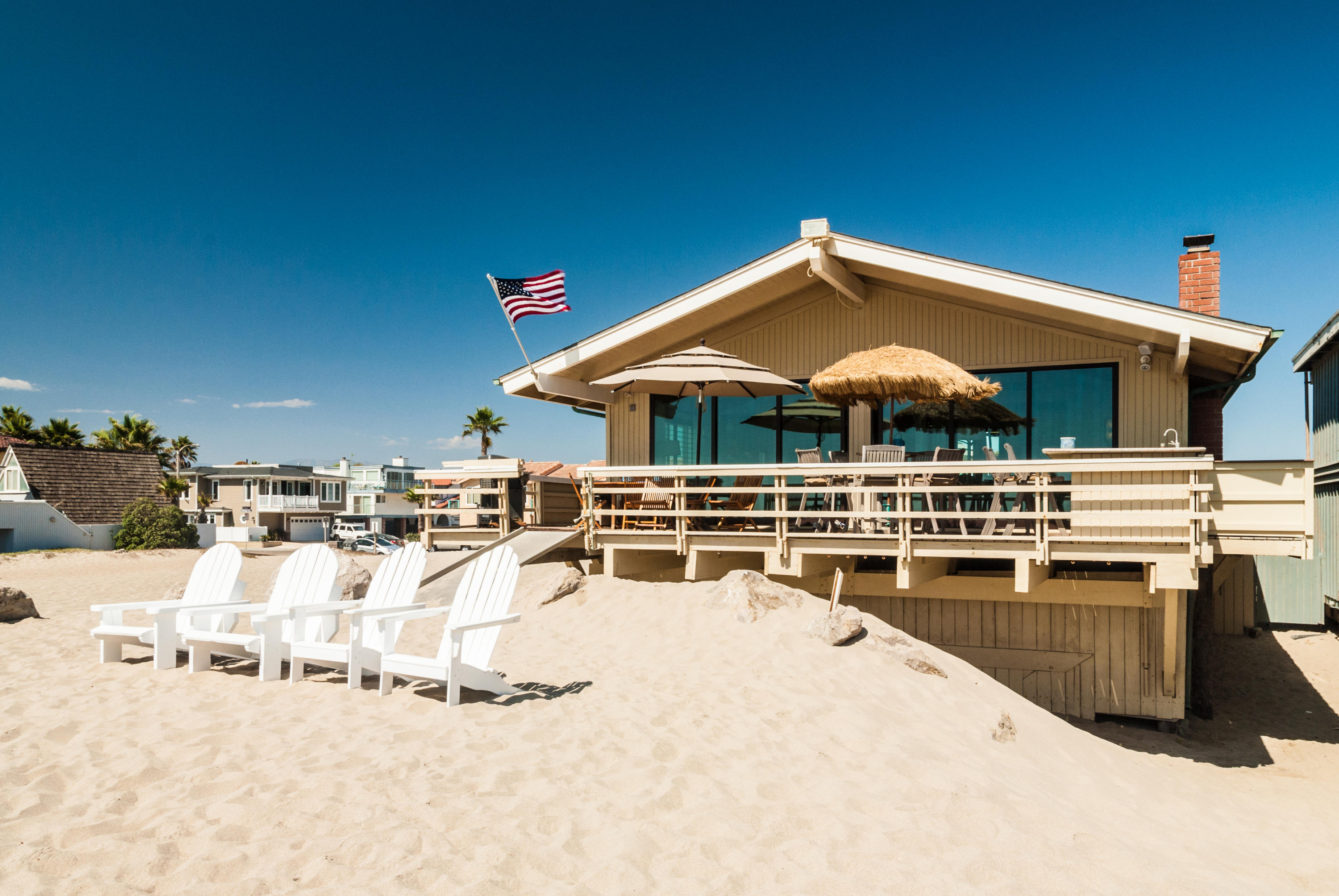 867 Mandalay Beach Road Oxnard, CA 93035 - Photo 6 of 27 a swimming pool with outdoor seating and yard