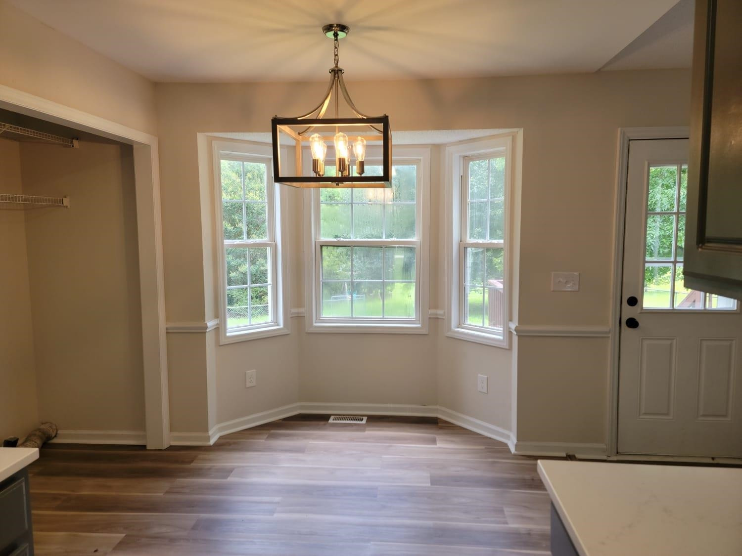 112 Pebblestone Court Willow Spring, NC 27592 - Photo 14 of 43 a view of empty room with wooden floor and fan