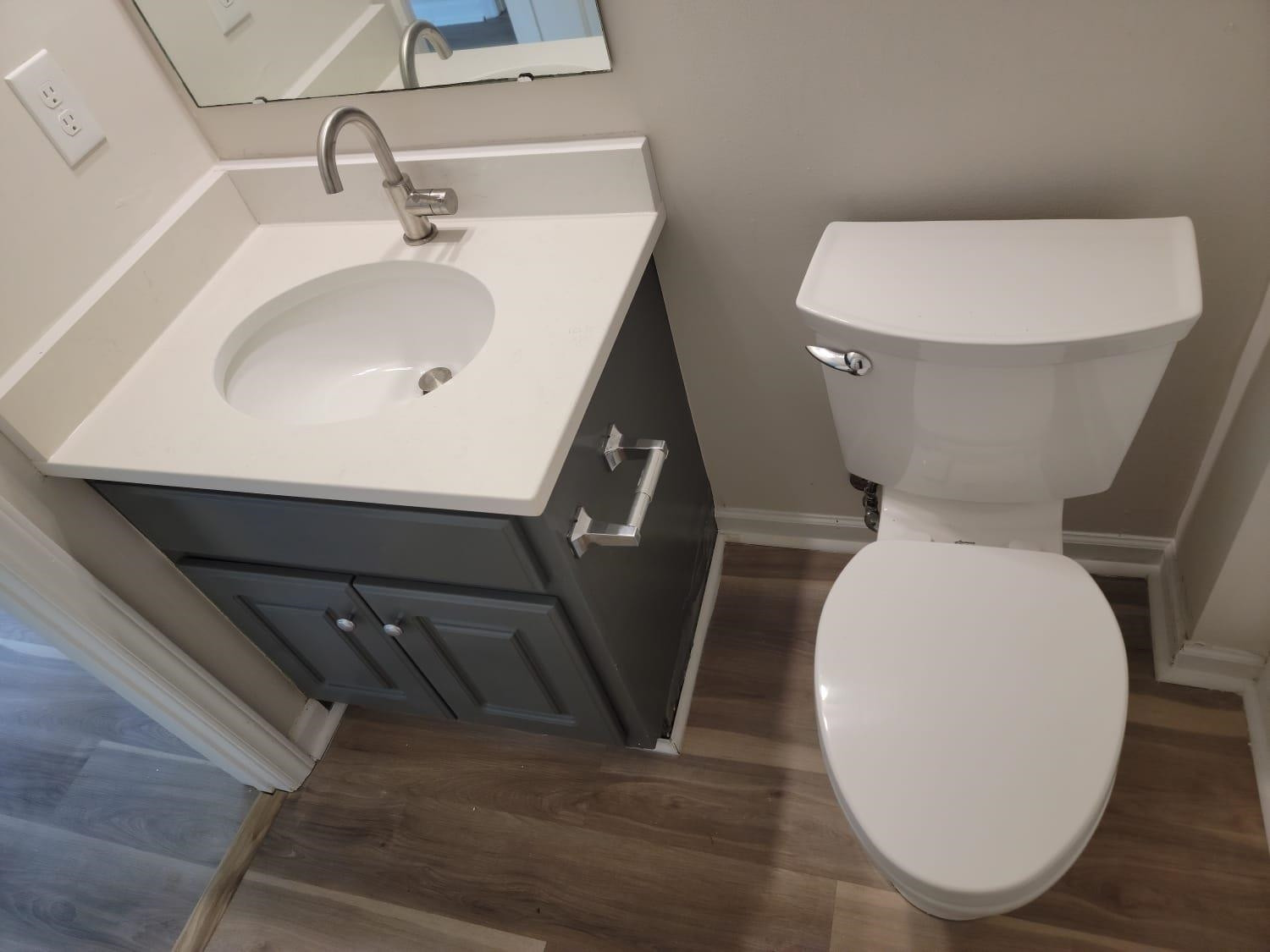 112 Pebblestone Court Willow Spring, NC 27592 - Photo 21 of 43 a bathroom with a toilet sink and mirror