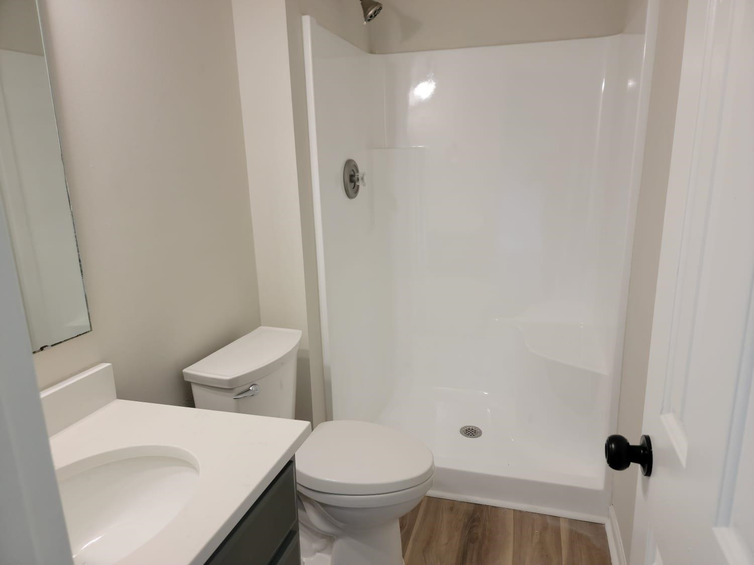 112 Pebblestone Court Willow Spring, NC 27592 - Photo 22 of 43 a white toilet sitting next to a bathroom sink