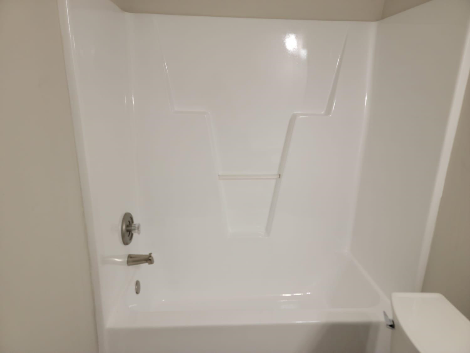 112 Pebblestone Court Willow Spring, NC 27592 - Photo 28 of 43 a bathroom with a bathtub