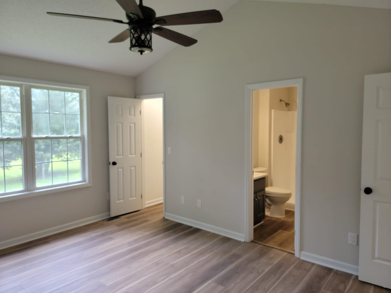 112 Pebblestone Court Willow Spring, NC 27592 - Photo 32 of 43 wooden floor in an empty room with a window