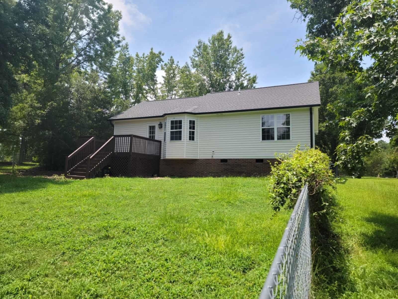 112 Pebblestone Court Willow Spring, NC 27592 - Photo 34 of 43 a house view with a garden space