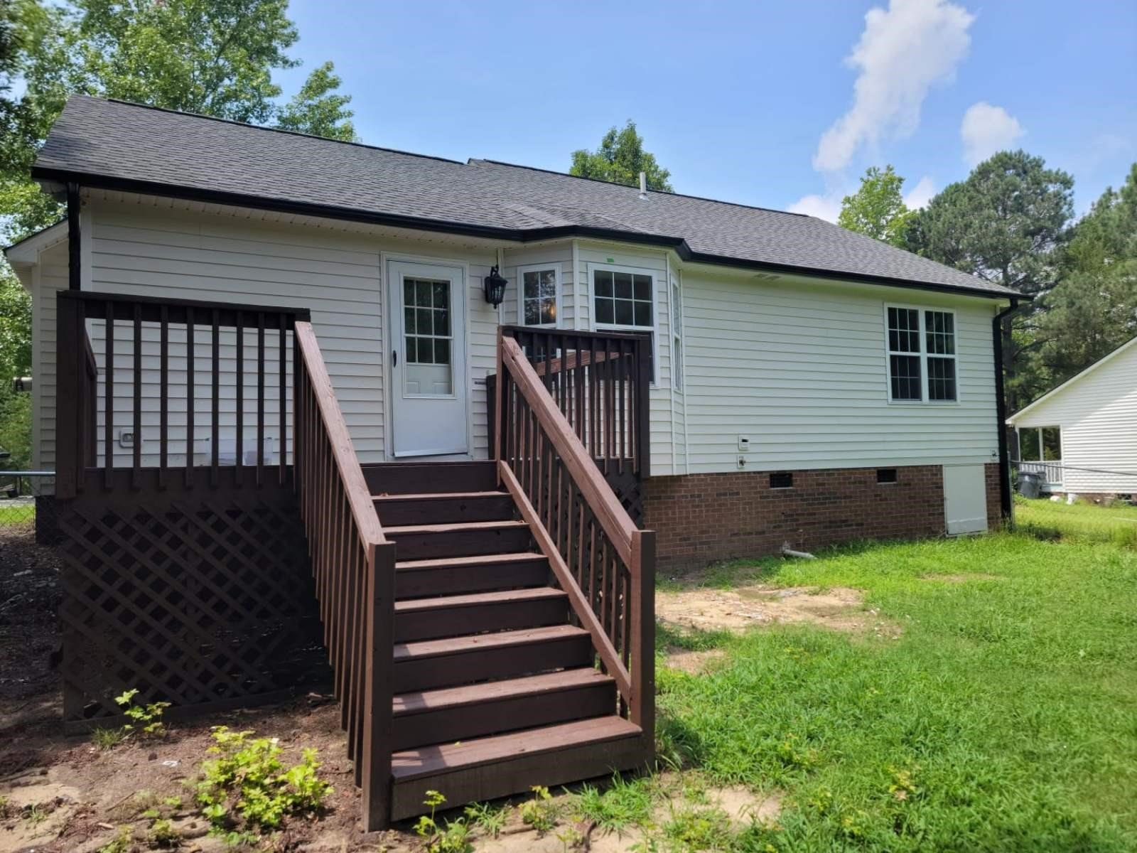 112 Pebblestone Court Willow Spring, NC 27592 - Photo 35 of 43 a view of a house with backyard and wooden fence