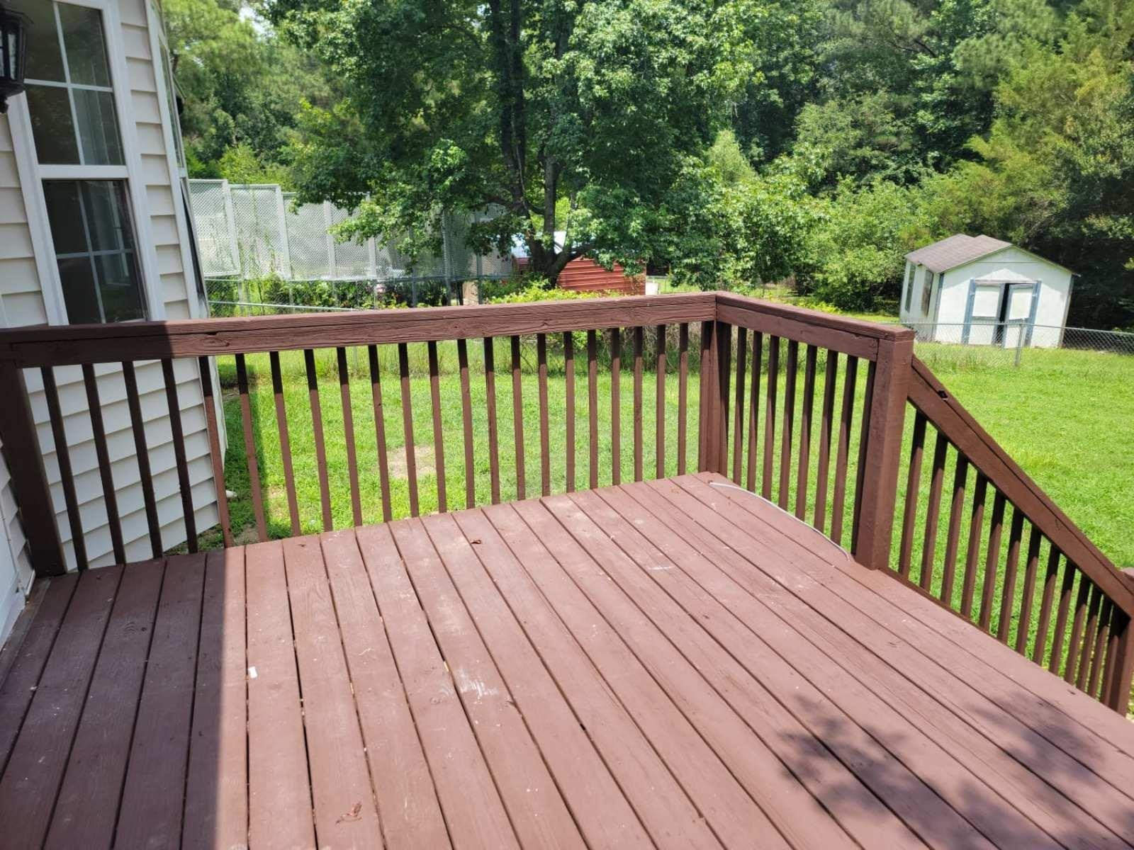 112 Pebblestone Court Willow Spring, NC 27592 - Photo 37 of 43 view of balcony with wooden floor and fence