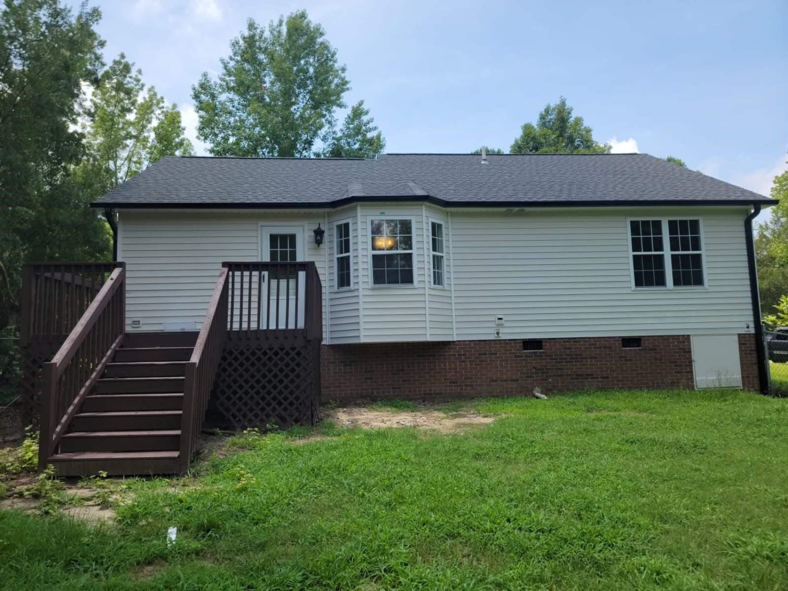 112 Pebblestone Court Willow Spring, NC 27592 - Photo 39 of 43 a front view of a house with a garden