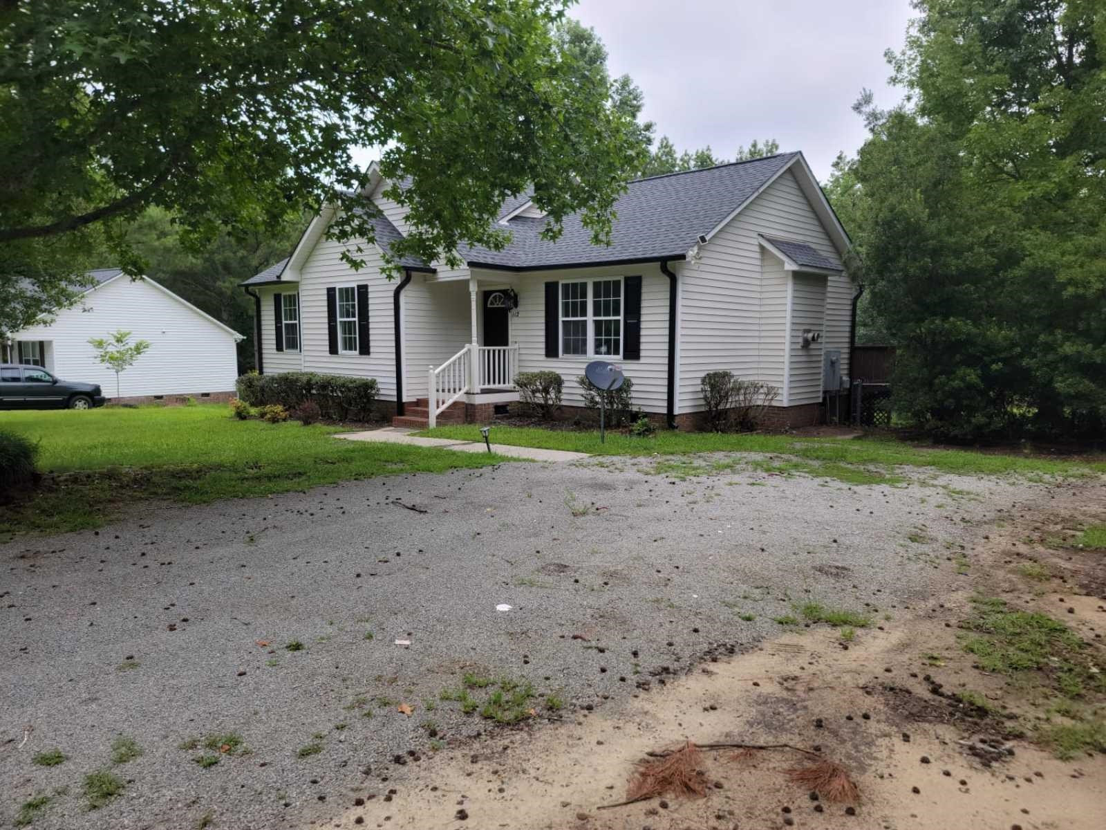 112 Pebblestone Court Willow Spring, NC 27592 - Photo 4 of 43 a view of a house with a yard