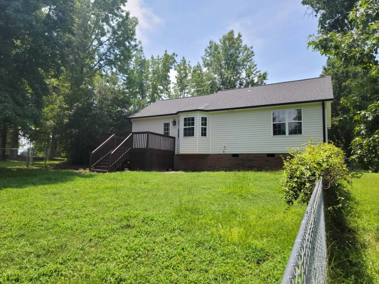 112 Pebblestone Court Willow Spring, NC 27592 - Photo 41 of 43 a house view with a garden space