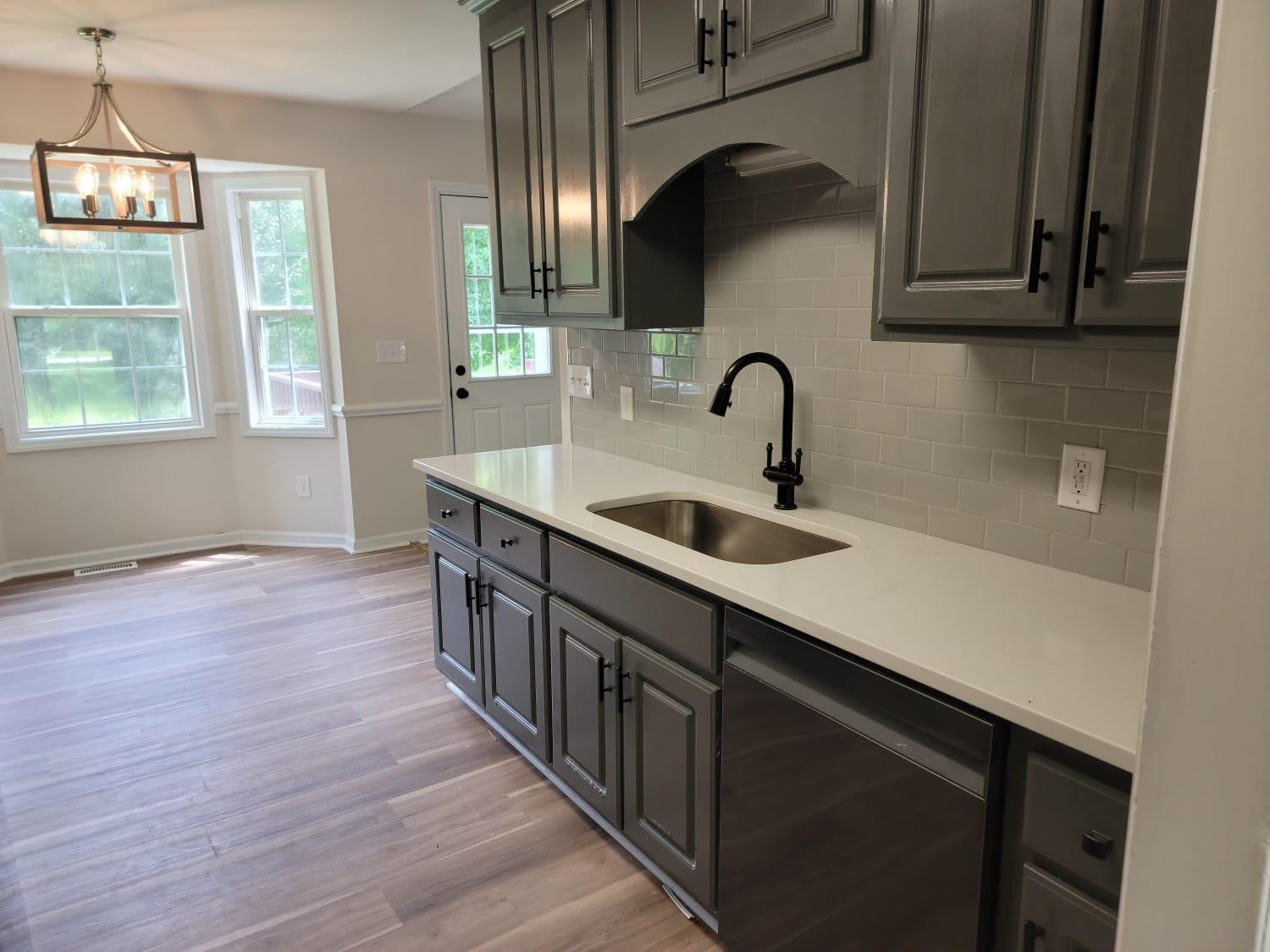 112 Pebblestone Court Willow Spring, NC 27592 - Photo 9 of 43 a kitchen with sink and cabinets