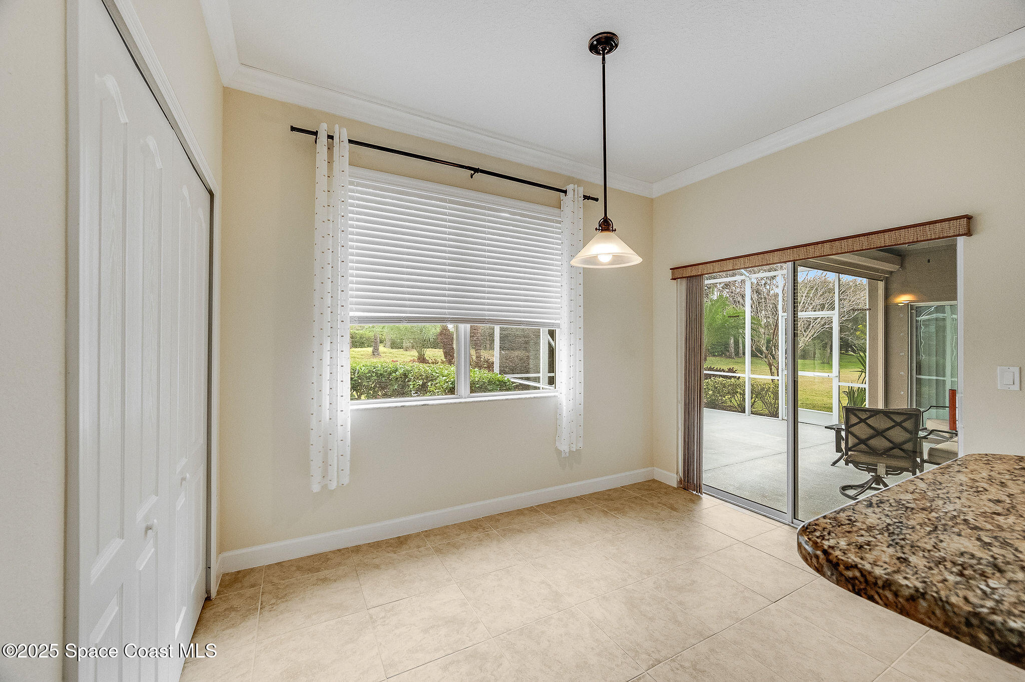 6531 Ingalls Street Melbourne, FL 32940 - Photo 25 of 46 a view of an empty room with windows