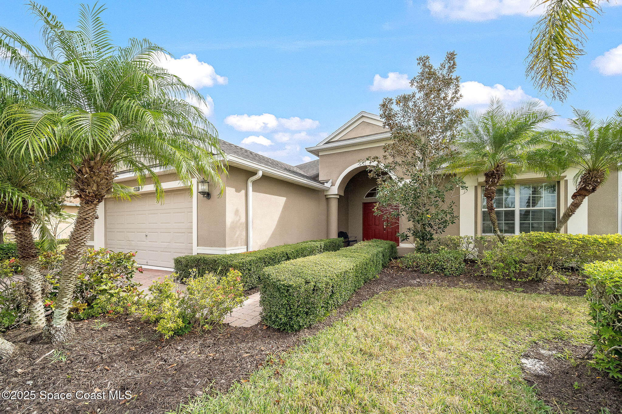 6531 Ingalls Street Melbourne, FL 32940 - Photo 37 of 46 a front view of a house with a yard