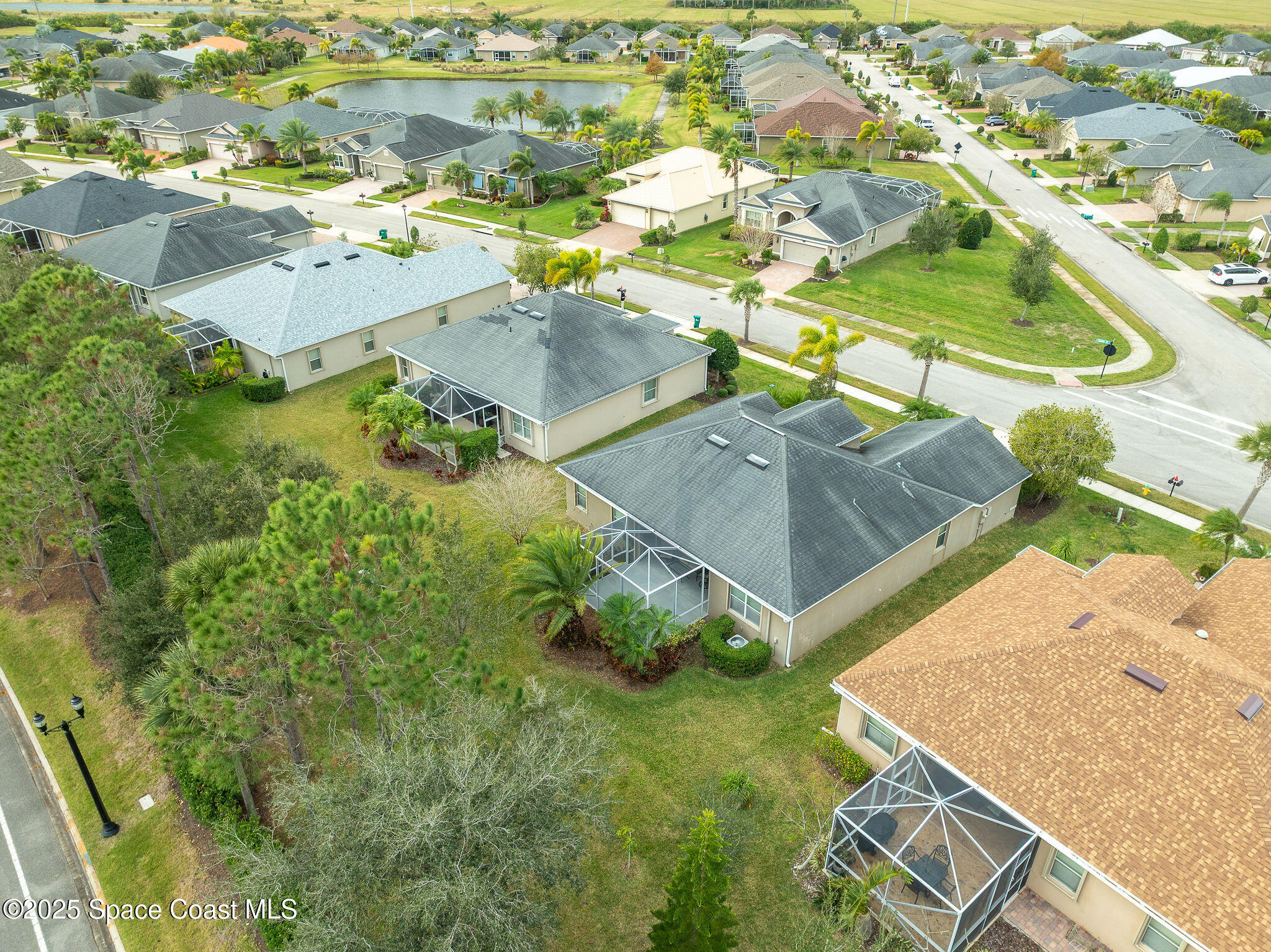 6531 Ingalls Street Melbourne, FL 32940 - Photo 5 of 46 an aerial view of residential houses with outdoor space