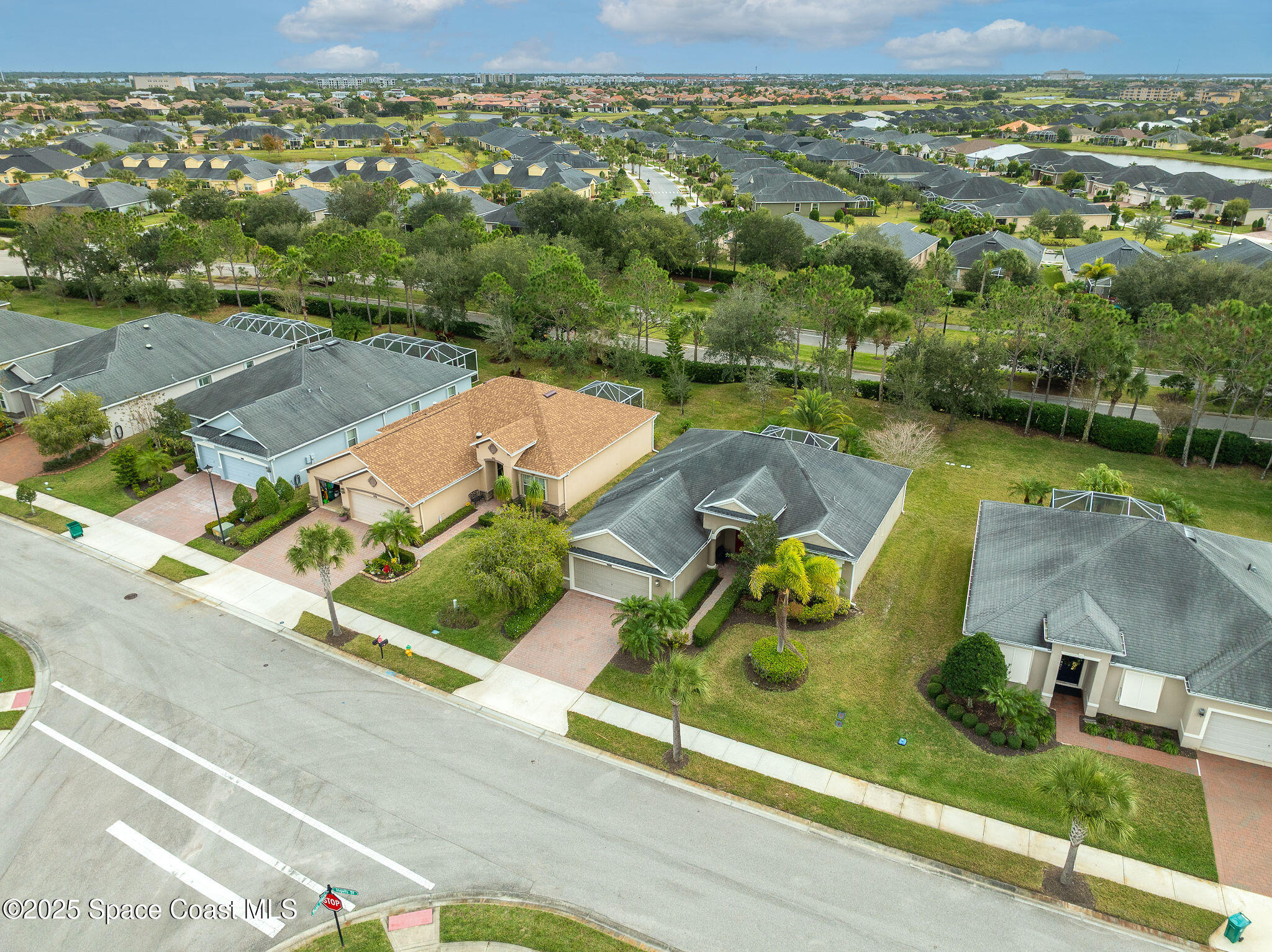 6531 Ingalls Street Melbourne, FL 32940 - Photo 6 of 46 an aerial view of a house with a garden