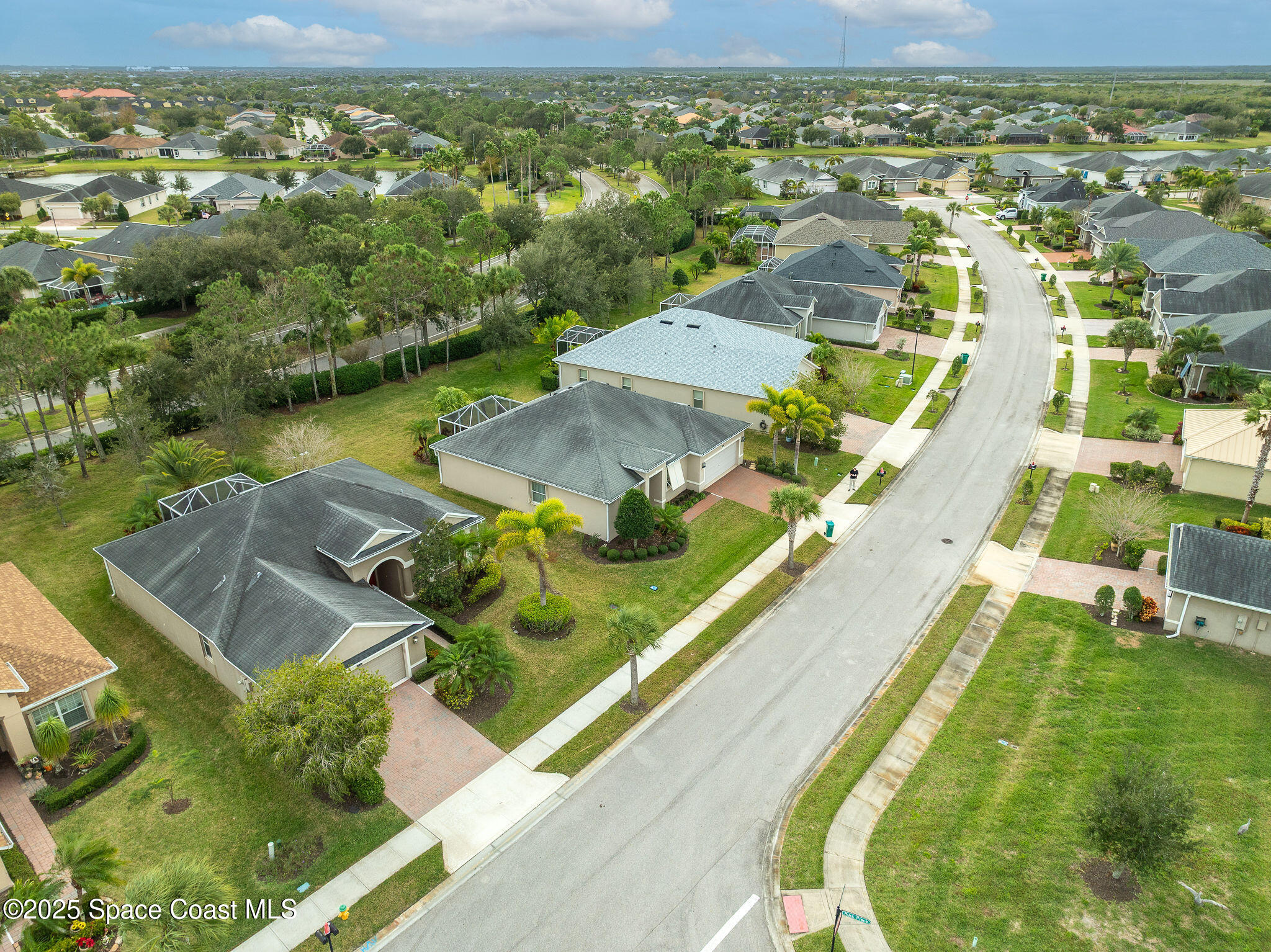 6531 Ingalls Street Melbourne, FL 32940 - Photo 7 of 46 an aerial view of residential houses with outdoor space and river
