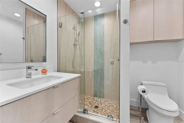 a view of a swimming pool with a lounge chair