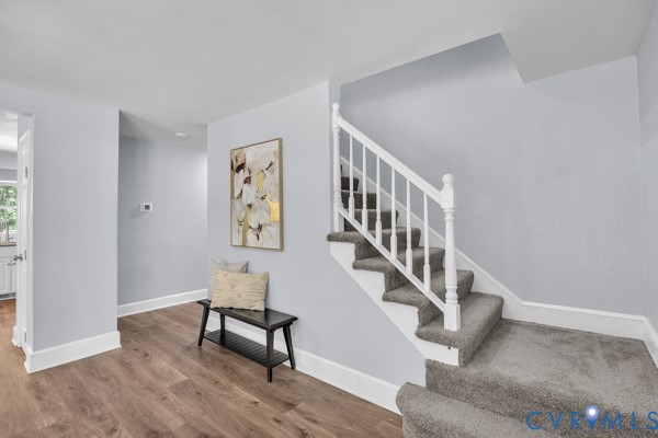 2330 Hubert Lane Chester, VA 23836 - Photo 22 of 43 Stairs featuring baseboards and wood finished floo