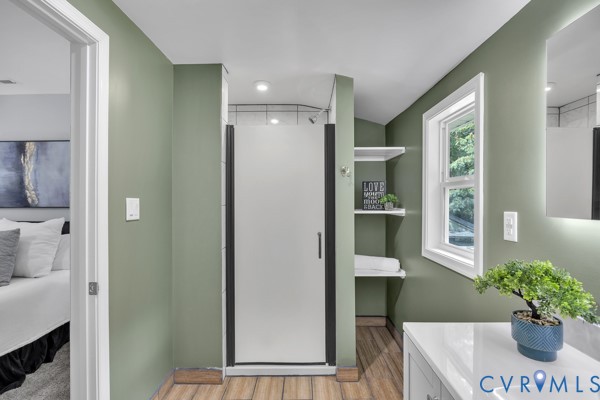 2330 Hubert Lane Chester, VA 23836 - Photo 27 of 43 Ensuite bathroom with a stall shower, wood finishe