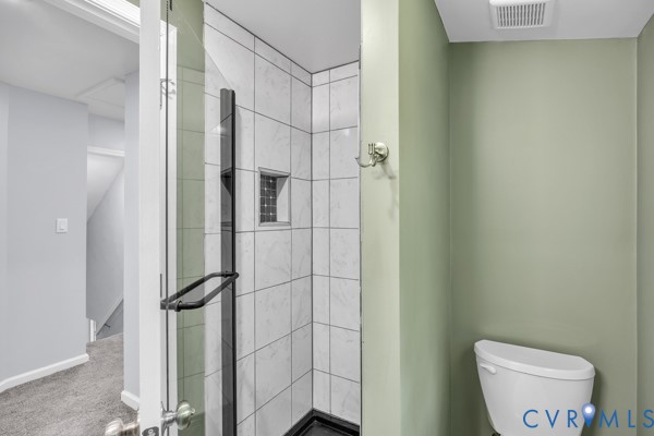 2330 Hubert Lane Chester, VA 23836 - Photo 30 of 43 Bathroom featuring toilet and a shower stall