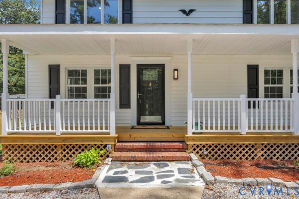 2330 Hubert Lane Chester, VA 23836 - Photo 4 of 43 View of exterior entry with a porch
