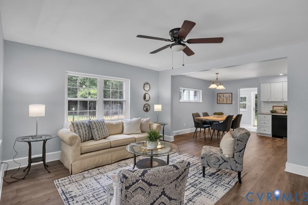 2330 Hubert Lane Chester, VA 23836 - Photo 7 of 43 Living area featuring ceiling fan, dark wood finis