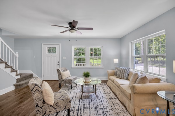 2330 Hubert Lane Chester, VA 23836 - Photo 9 of 43 Living area featuring stairs, wood finished floors