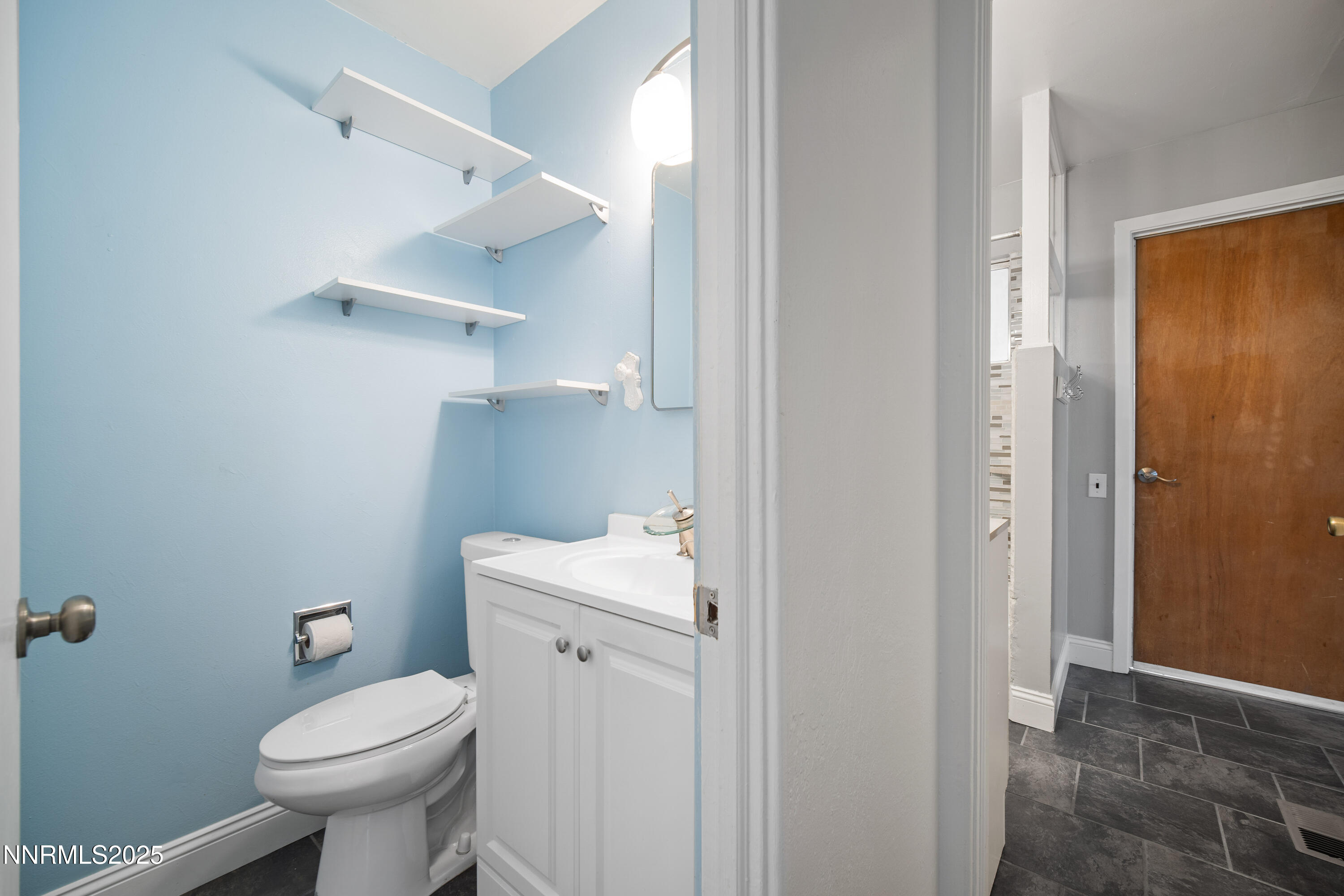 1895 Citron Street Reno, NV 89512 - Photo 23 of 37 a bathroom with a toilet and a sink