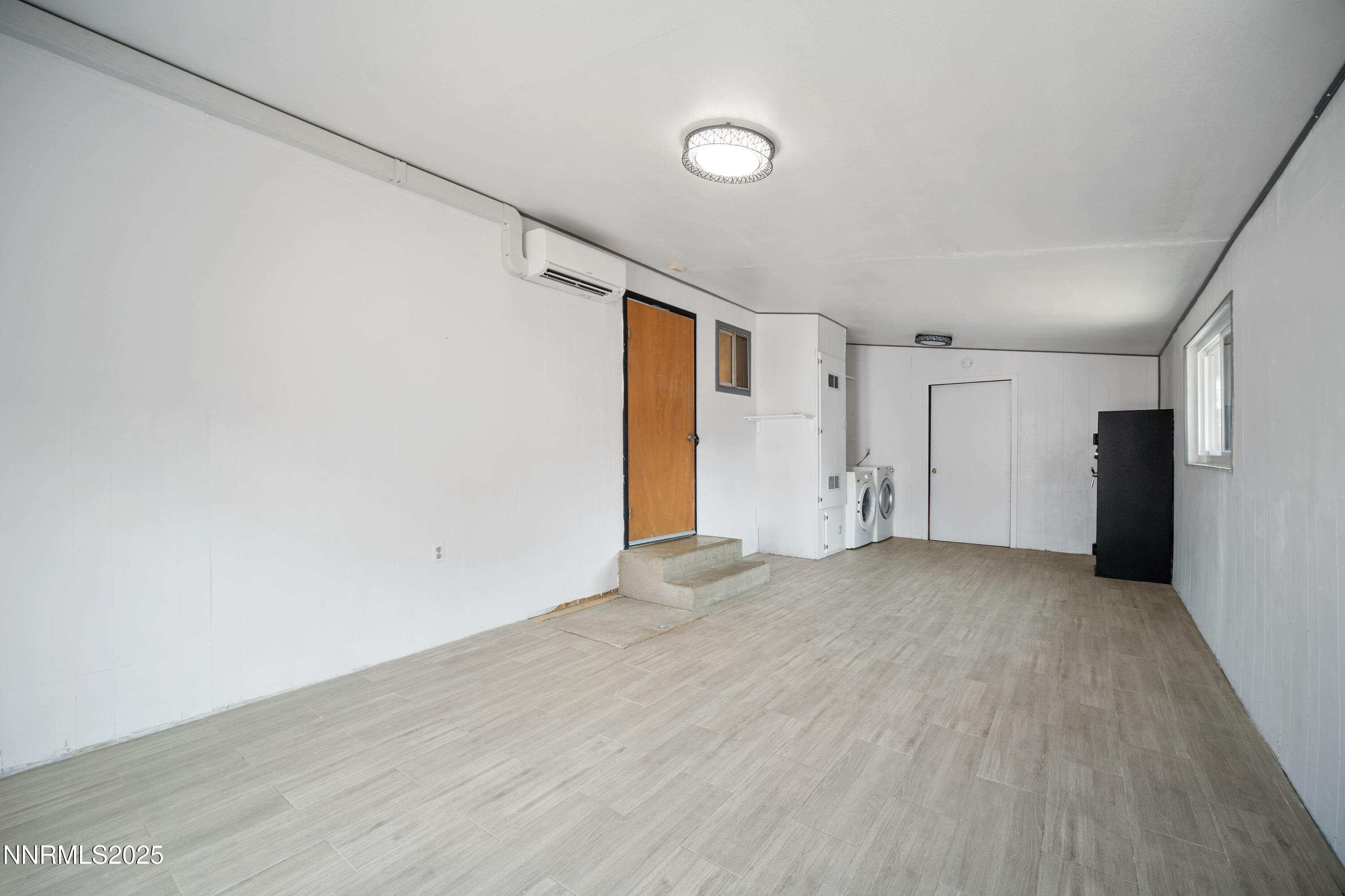 1895 Citron Street Reno, NV 89512 - Photo 24 of 37 a view of empty room with wooden floor and window