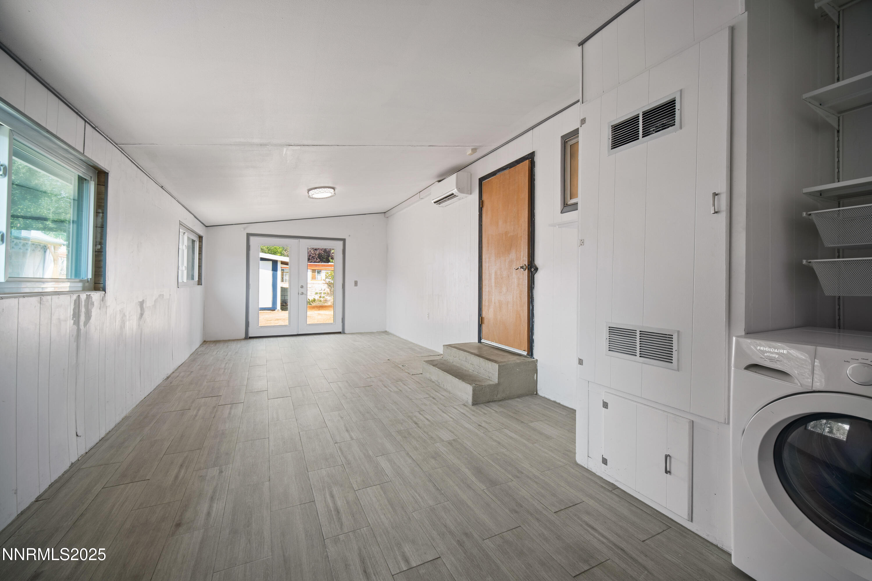 1895 Citron Street Reno, NV 89512 - Photo 26 of 37 a view of a big room with wooden floor and windows