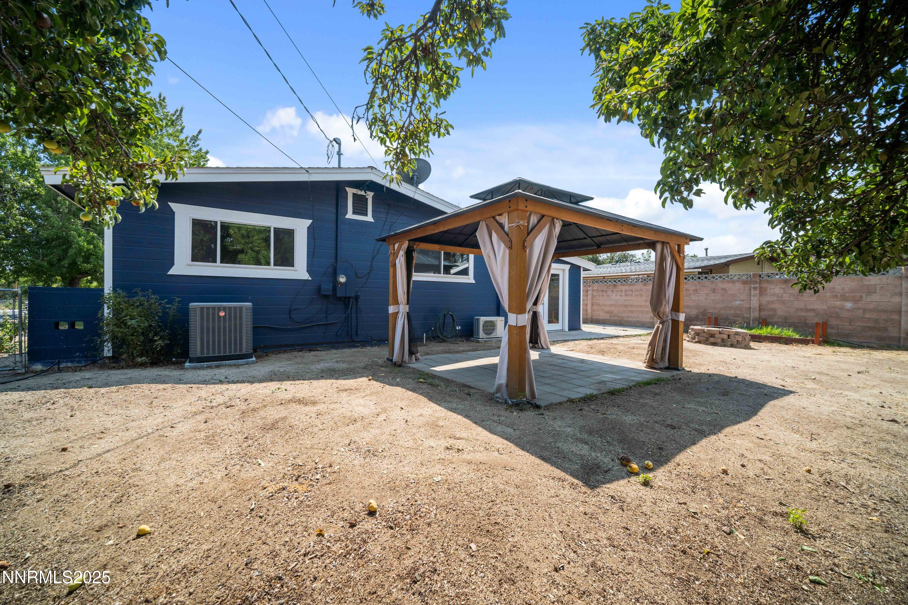 1895 Citron Street Reno, NV 89512 - Photo 35 of 37 a front view of a house with a yard