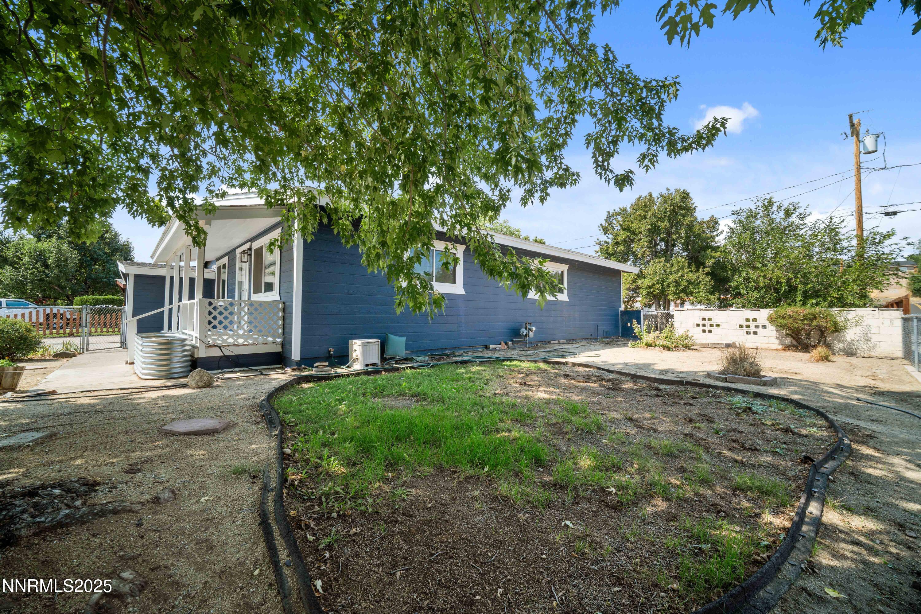 1895 Citron Street Reno, NV 89512 - Photo 5 of 37 a view of a house with a yard