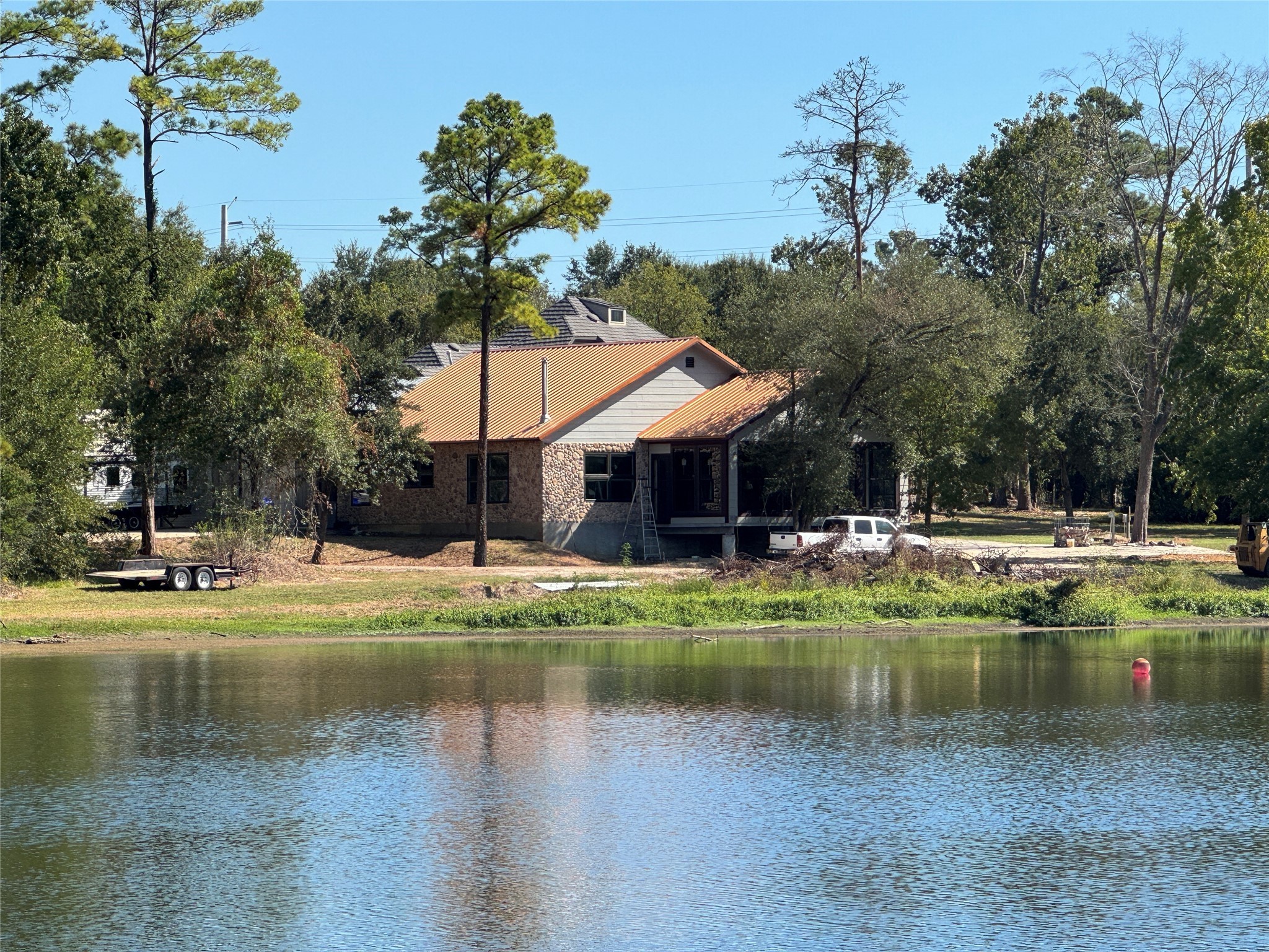 10505 Crosby Lynchburg Road Highlands, TX 77562 - Photo 12 of 24 a house view with swimming pool and sitting space