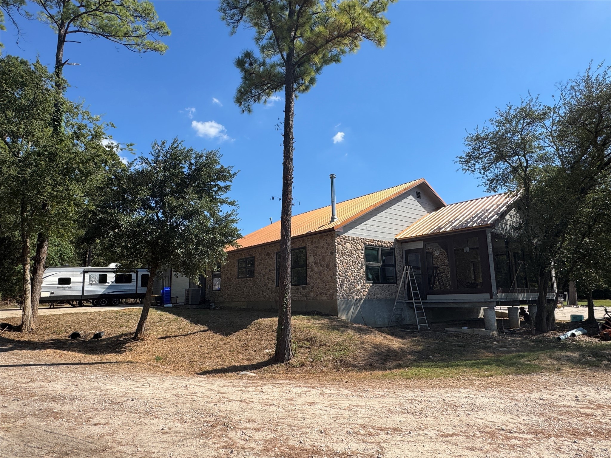 10505 Crosby Lynchburg Road Highlands, TX 77562 - Photo 13 of 24 a view of a house with a yard