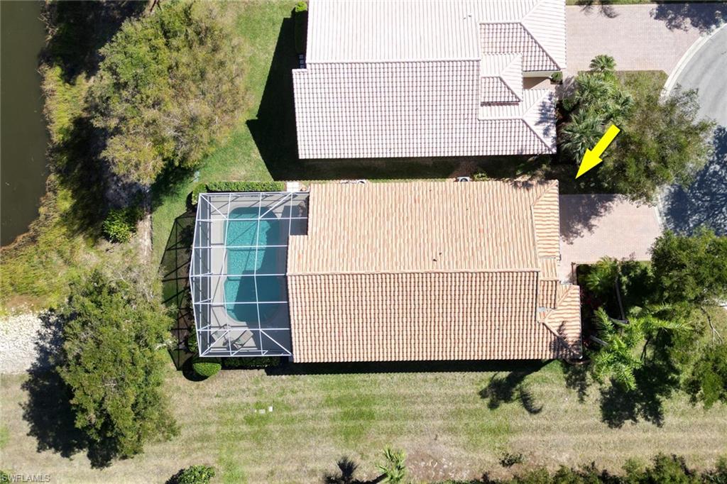 9001 Springview Loop Estero, FL 33928 - Photo 31 of 50 front view of a house with a yard