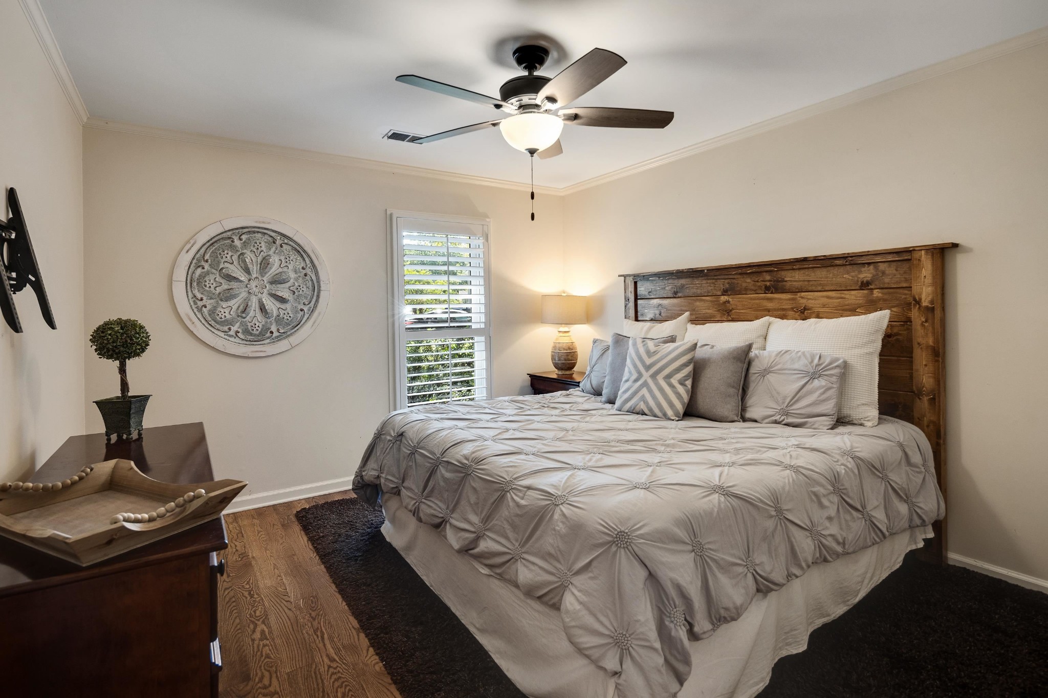 8774 Yorkchester Road Memphis, TN 38139 - Photo 11 of 23 a bedroom with a bed and a chandelier