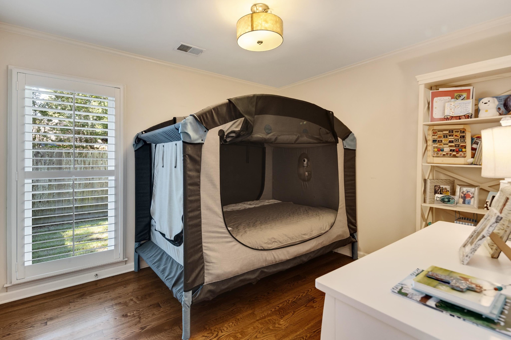 8774 Yorkchester Road Memphis, TN 38139 - Photo 14 of 23 a bedroom with bed and a window