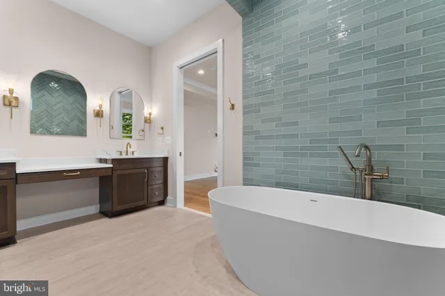 a view of a room with wooden floor and stairs