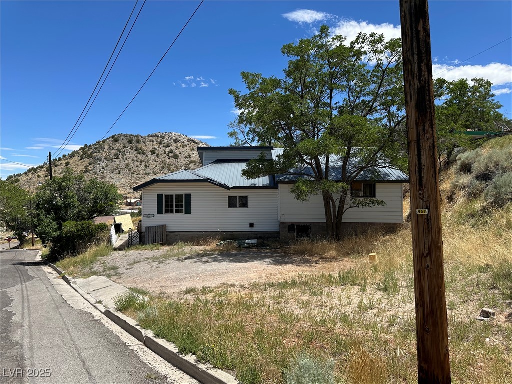 336 Hoffman Street Pioche, NV 89043 - Photo 1 of 36 View of property exterior with a mountain view and a metal roof