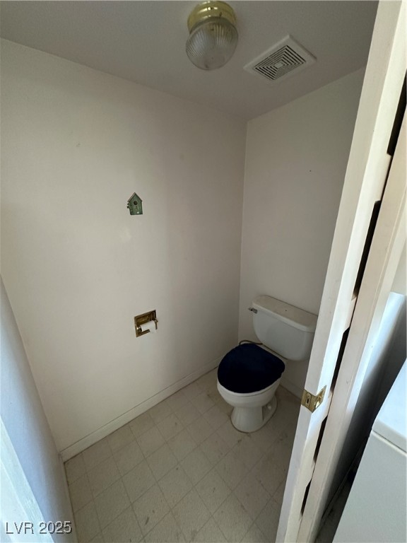 336 Hoffman Street Pioche, NV 89043 - Photo 19 of 36 Bathroom with toilet and tile patterned floors