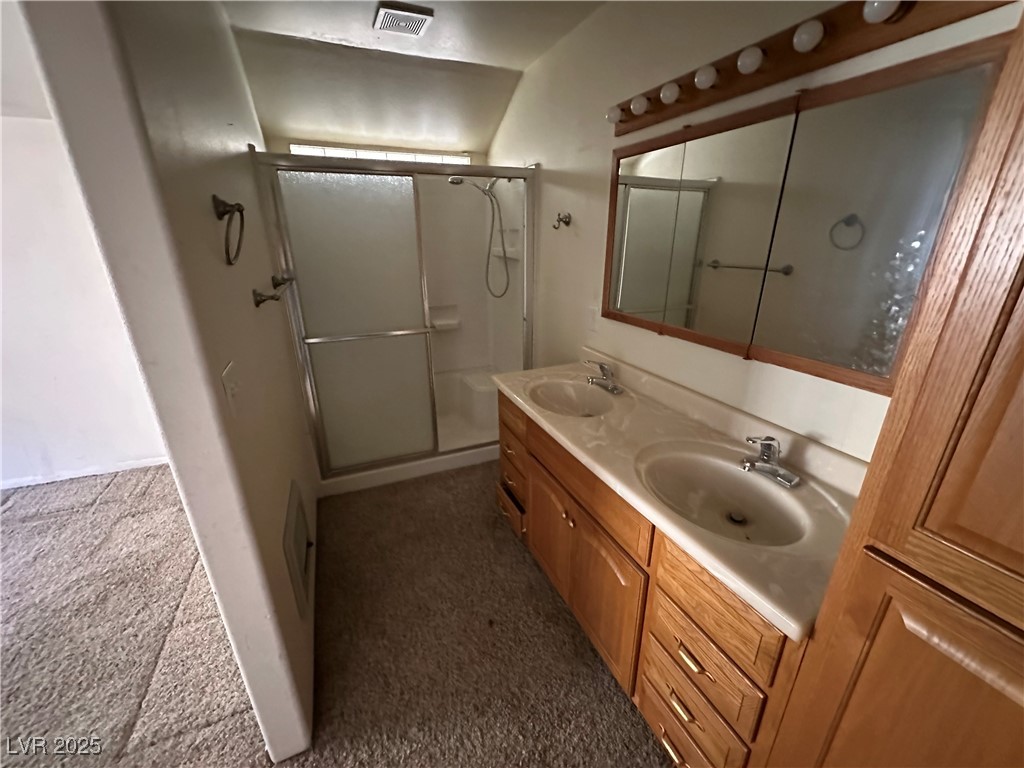 336 Hoffman Street Pioche, NV 89043 - Photo 30 of 36 Bathroom featuring an enclosed shower and double vanity