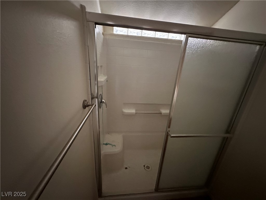 336 Hoffman Street Pioche, NV 89043 - Photo 34 of 36 Full bathroom featuring a shower with door